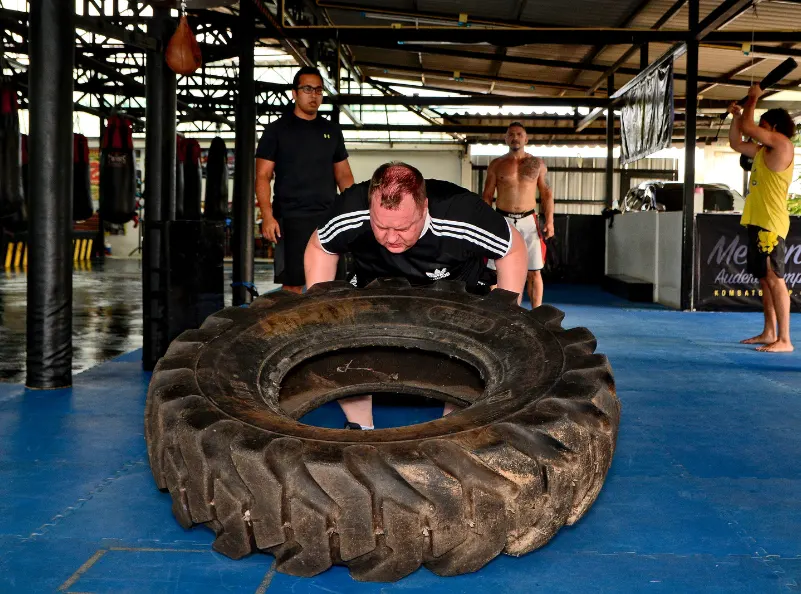 Flipping the tire during fitness calss