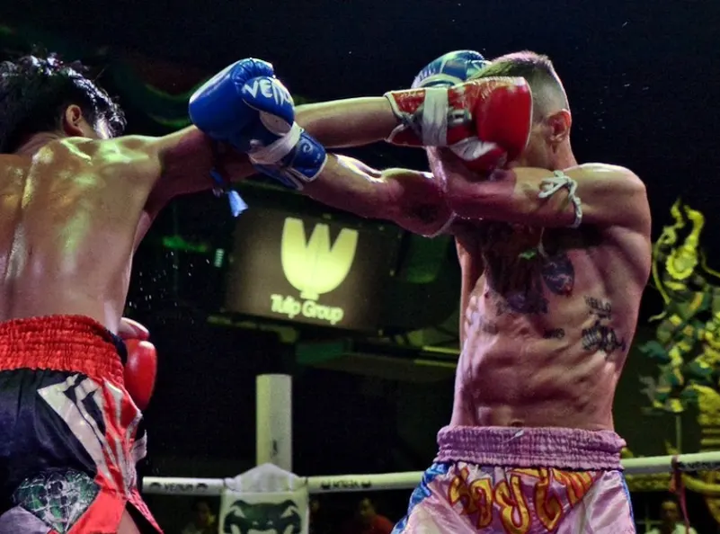 Block during a muay thai fight